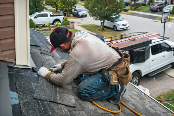 Professional Roofing technician working in Grover, CO